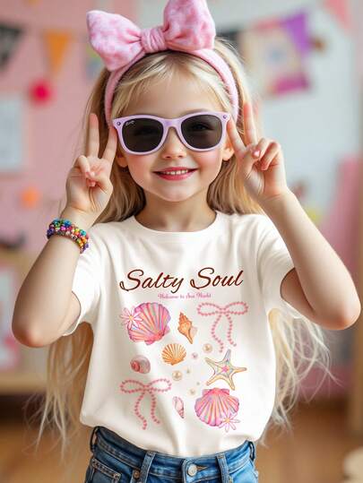 SHEIN Cream White, Salty Soul Sweet Starfish Shell Pearl Bow Graphic Tee, Young Girl Casual Minimalist Short Sleeve Round Neck T-Shirt Suitable For Spring/Summer Daily, Street, Outing, Home, Vacation, Homecoming, Spring & Summer Girls Outfits For , Easy Comfort, Spring & Summer Sets For Girls, Stylish Girls, Casual Wear, Girls Vacation Beach Vibe Graphic Tee, Spring & Summer Fashion, Laid-Back Style, Relaxed Chic, Chill Vibe Outfits, Chill Chill