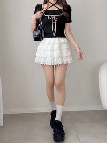 FRIFUL 女士撞色滚边羊腿袖交叉前襟T恤，时尚夏季款 - 黑色 - 查看 4