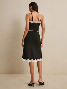 Poéselle 女士黑色撞色蕾丝吊带背心和中长吊带裙两件套 – 轻松打造约会之夜造型 蕾丝边吊带背心，黑色吊带裙套装，美观时尚，两件套搭配，缎面中长裙，约会之夜穿搭，优雅套装 优雅蕾丝拼接吊带背心和半身裙两件套 夏季穿搭 复活节海滩穿搭 婚礼毕业典礼休闲套装 女士度假穿搭 女士正装 女士Y2K工作穿搭 黑色半身裙和黑色上衣 黑色套装 - 黑色 - 查看 5