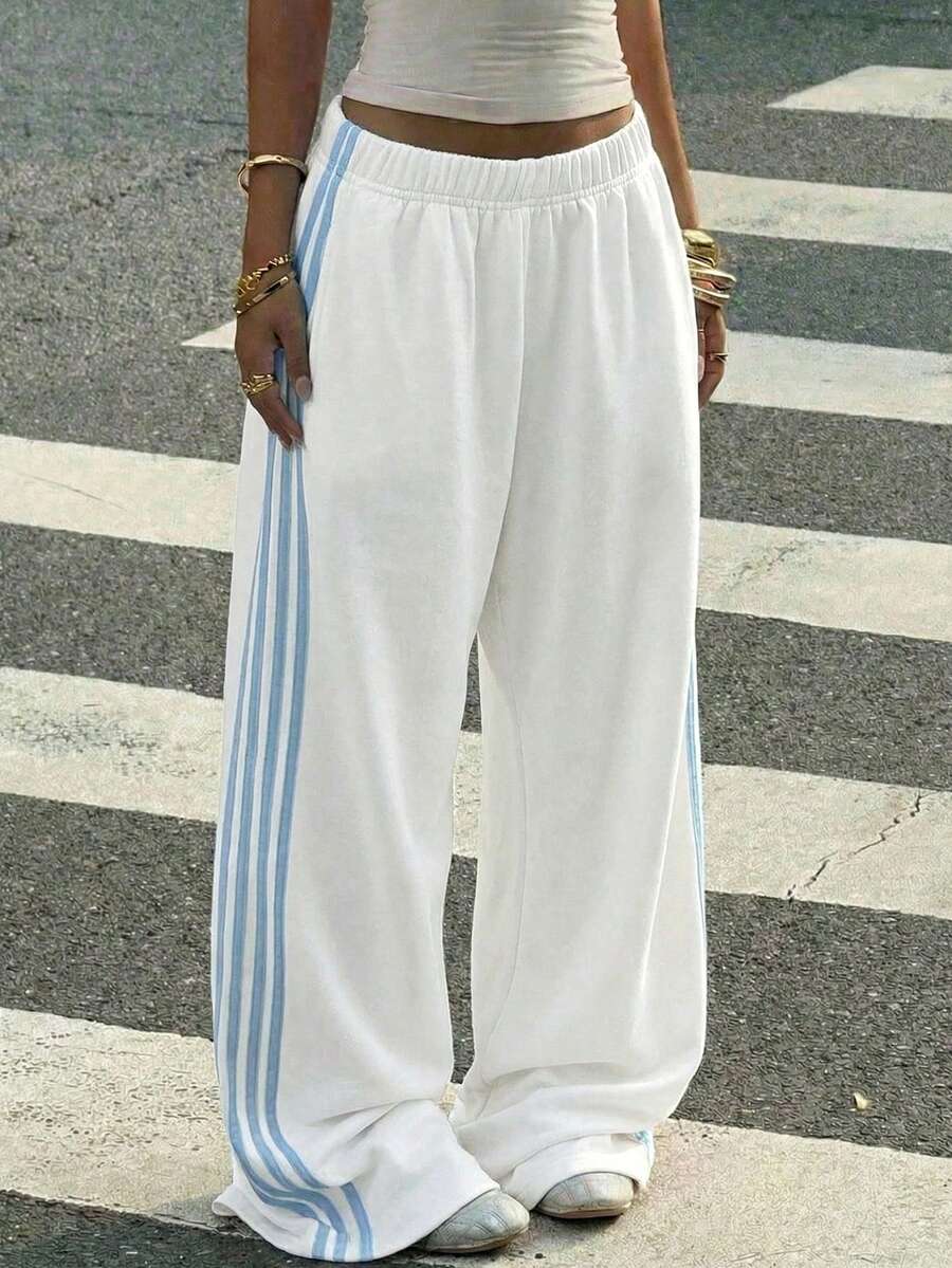 Muchica Quần nỉ ống rộng dáng casual màu trắng phối họa tiết ruy băng xanh lá cây dành cho nữ - trắng - Xem 1