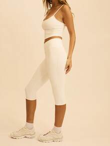 Aralina Bộ đồ thể thao nữ gồm áo hai dây ngắn màu trơn và quần legging lửng 7/8. - trắng - Xem 9