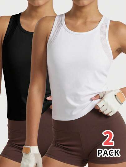 这款两件套背心套装适合 8-12 岁的女孩，采用黑白撞色设计，巧妙的网眼拼接增强透气性，背面饰有反光银色热转印图案。面料光滑高弹，活动自如，是春夏户外健身训练的理想运动服。