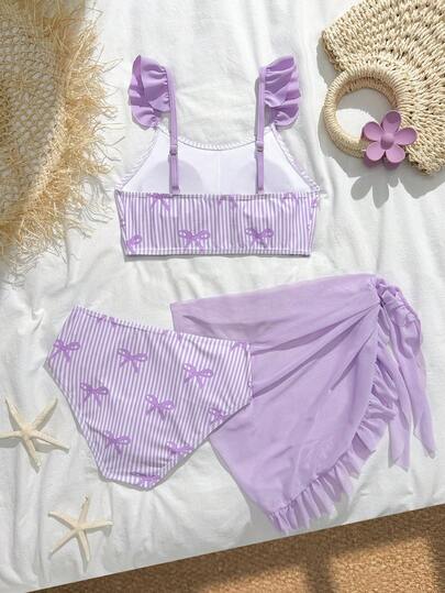 SHEIN Bộ bikini cho bé gái tuổi teen - Áo ngắn in họa tiết sọc dọc màu tím trơn, phối cùng nơ màu tím trơn, quần kiểu dáng thông thường với váy yếm in họa tiết có dây buộc bên hông và tua rua - Bộ đồ bơi ba mảnh có thể tách rời - Thời trang, giản dị, thanh lịch và nữ tính - Thích hợp cho bơi lội, kỳ nghỉ hè, bãi biển, hồ bơi, trại hè, tiệc tùng, những dịp thường ngày và thư giãn. Bộ đồ bơi hai mảnh kín đáo màu tím oải hương cho bé gái tuổi teen, bộ đồ bơi hai mảnh có váy, đồ đi biển cho bé gái tuổi teen, trang phục đi biển cho bé gái, trang phục nghỉ hè cho bé gái, bộ đồ phối hợp, áo nữ cho mùa hè, trang phục mùa hè cho bé gái, đồ bơi cho bé gái, trang phục nghỉ hè cho bé gái, trang phục mùa hè.
