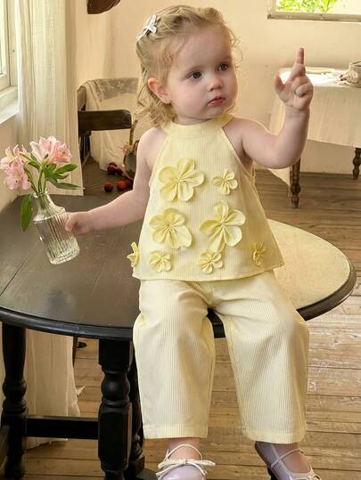 SHEIN 2pcs Baby Girl Children Woven Striped Round Neck Halter Top With 3D Floral Decor, Paired With Elastic Waist Striped Pants, Fresh And Cute Style, Suitable For Summer, Loose Fit For Various Occasions Like Vacation, Travel, Daily Wear Light Yellow Baby Clothes Baby Flower Outfit