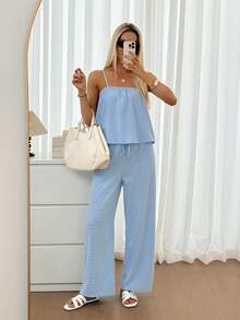Easowa Bộ 2 món gồm áo liền quần vải màu xanh dương khoét eo dành cho nữ, áo hai dây và quần có túi, thích hợp cho kỳ nghỉ lãng mạn, lễ hội âm nhạc, dự đám cưới và mặc thường ngày. - Màu xanh nhạt - Xem 3
