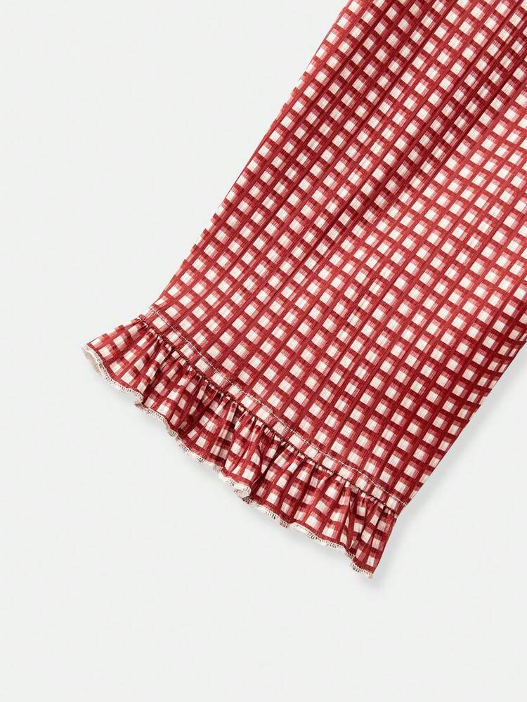 Low-Rise Black Jacquard Knit Capri Pants With White Floral Pattern And Ruffle Details Cute Style Spring Summer Vacation French Style Parisian Style Red Checkered Shorts Red Gingham Shorts