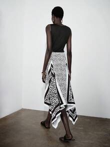 Lumivelle Women's New Round Neck Ribbed Knit Fabric Patchwork Leopard Print Asymmetrical Hem Casual Minimalist Fashion Dress, Spring/Summer Asymmetrical Skirt Wrap Skirt Black And White Skirt Graphic Print Skirt Pattern Skirt - Multicolor - View 2