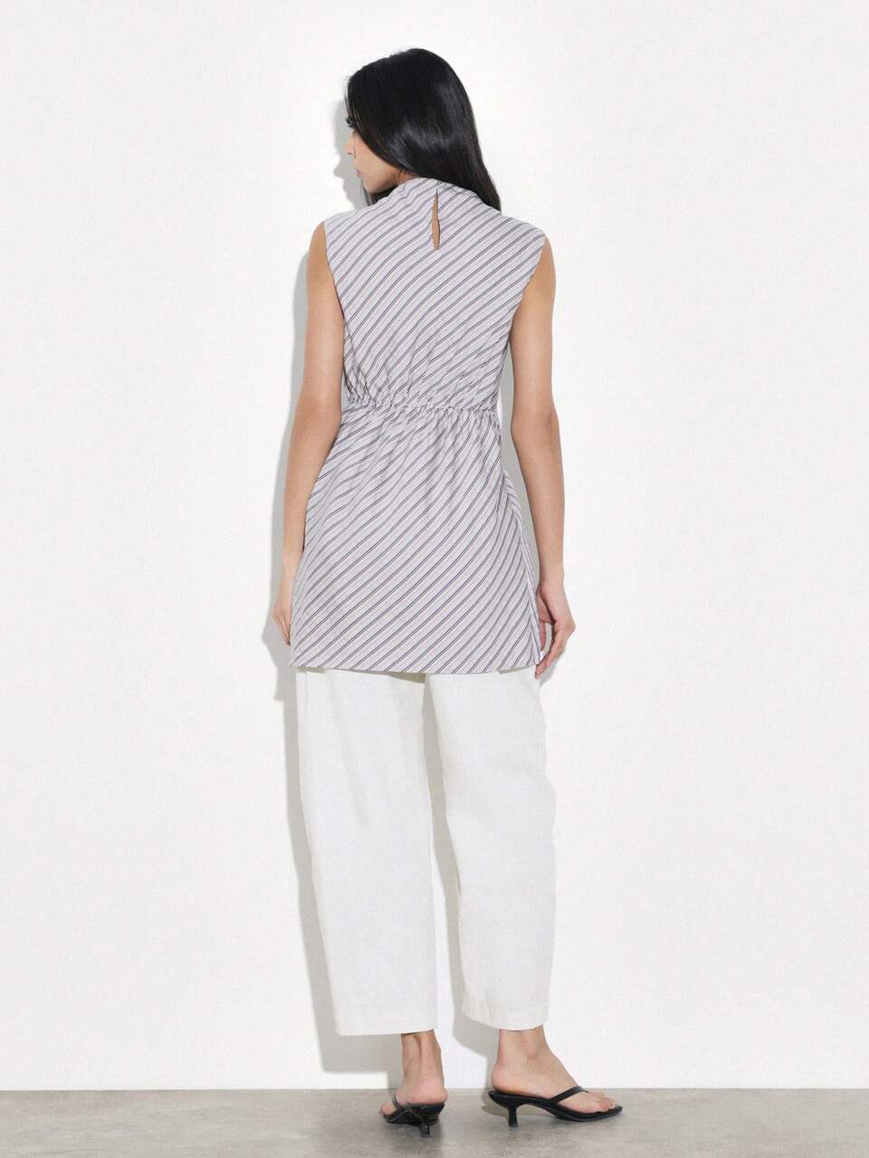 KSTM Striped Mock Neck Sleeveless Mini Dress With Asymmetrical Hemline And Side Tie Detail For Casual Day Occasions