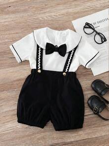 Souflis Souflis Bộ quần áo lịch lãm 2 món cho bé trai, áo sơ mi cổ điển kèm nơ và quần yếm, phù hợp cho trẻ sơ sinh, các dịp trang trọng như đám cưới, tiệc tùng, sinh nhật; kiểu dáng ôm sát, chất liệu mềm mại; kết hợp với nơ thời trang; phong cách và thanh lịch, giúp bé yêu của bạn trở thành tâm điểm chú ý. - Nhiều màu - Xem 3