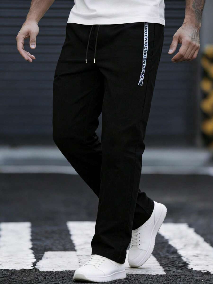 EGENSIO Quần nam in chữ, cạp chun có túi, kiểu dáng thường ngày. - màu đen - Xem 1