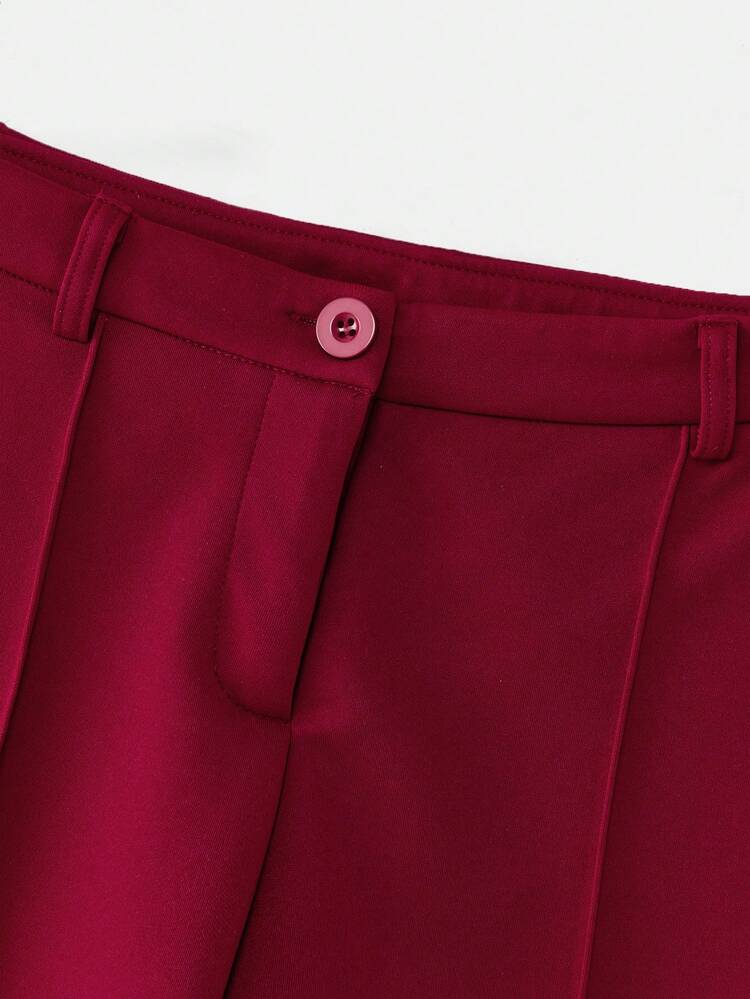 Pantalon capri slim fit noir avec coutures avant
