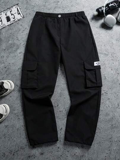 Manfinity Sport Corelite 男士休闲时尚街头日常通勤徽章装饰翻盖口袋工装裤