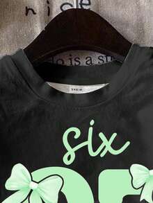 少女休闲简约个性酷炫数字67，蝴蝶结装饰，黑色短袖圆领印花T恤，适合夏季穿着。67号T恤，女童T恤，6T服装，街头服饰，女童休闲圆领T恤。 - 彩色 - 查看 4