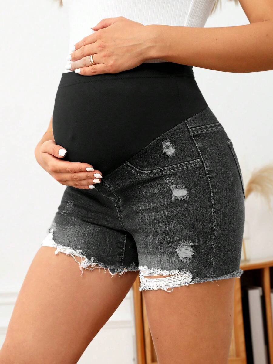 SHEIN Shorts vaqueros de maternidad con dobladillo deshilachado y cintura ajustable - Negro - Ver 1