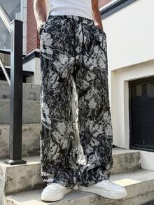 Manfinity Homme 男士街头风运动休闲裤，采用INS风格高街字母印花设计，非常适合波士顿周末短途旅行、音乐节、夏威夷海滩度假以及日常休闲穿着，秋季必备。 - 黑色 - 查看 6