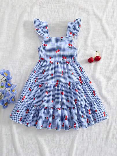 Vintaside Kids 这款少女夏季浅蓝色花园风长款吊带连衣裙，采用梭织面料，A字版型，柔和的浅蓝色调搭配精致的吊带设计，裙摆上点缀着白色小花图案，宛如春日盛开的花朵。肩带的荷叶边设计巧妙可爱，更添甜美层次感。适合假日海滩玩耍、郊游、居家休闲、婚礼、生日、派对表演等各种场合。