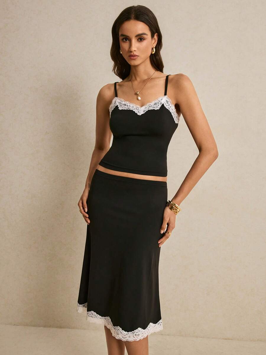Poéselle 女士黑色撞色蕾丝吊带背心和中长吊带裙两件套 – 轻松打造约会之夜造型 蕾丝边吊带背心，黑色吊带裙套装，美观时尚，两件套搭配，缎面中长裙，约会之夜穿搭，优雅套装 优雅蕾丝拼接吊带背心和半身裙两件套 夏季穿搭 复活节海滩穿搭 婚礼毕业典礼休闲套装 女士度假穿搭 女士正装 女士Y2K工作穿搭 黑色半身裙和黑色上衣 黑色套装