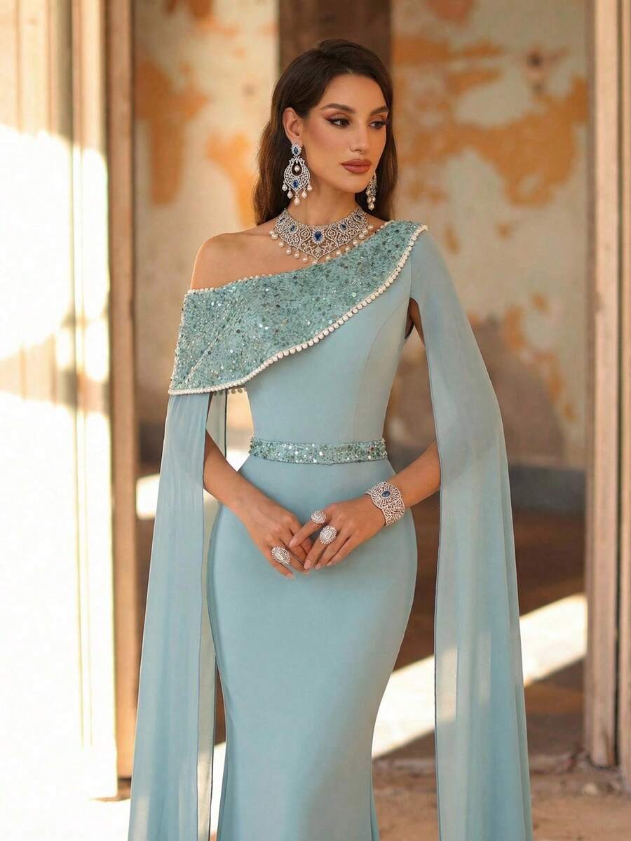 Aureia 优雅、浪漫、时尚、端庄的绿色弹力面料连衣裙，饰有亮片和鱼尾裙摆，适合优雅派对、婚礼宾客着装、绿色晚礼服、时尚优雅的婚礼/正式晚宴礼服。