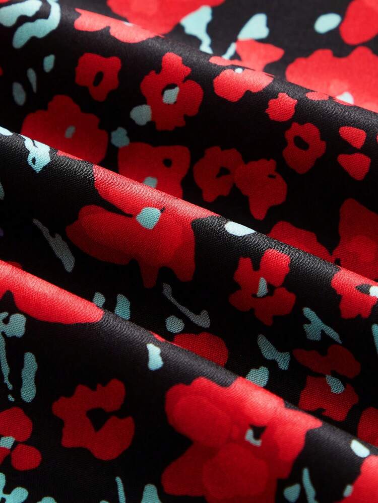 Robe mi-longue sans manches à imprimé floral noir