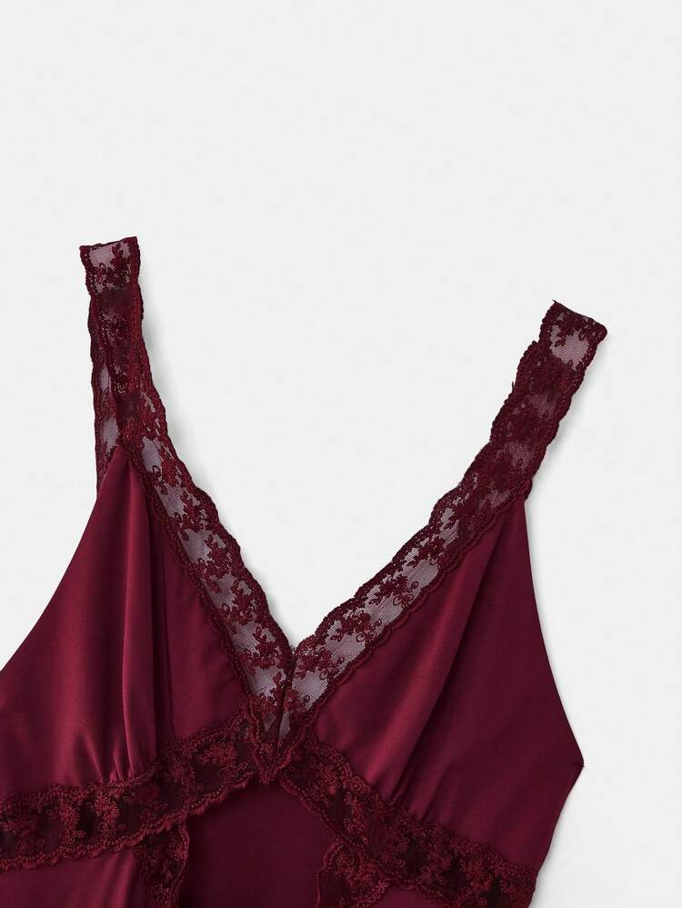 Burgundy Fitted Midi Dress With Lace Trim V Neckline Front Cut Out Detail Sleeveless Design And Elegant Silhouette Romantic Evening Dress French Style Parisian Style Vacation Outfit