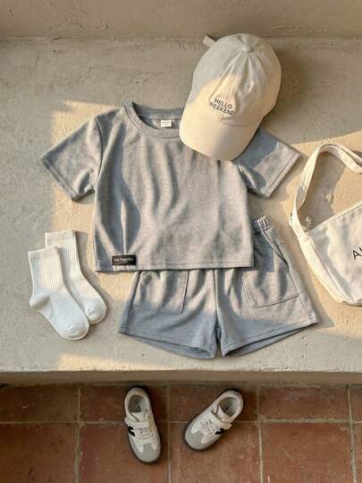 少女休闲时尚圆领短袖露脐上衣和短裤套装