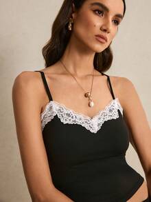 Poéselle 女士黑色撞色蕾丝吊带背心和中长吊带裙两件套 – 轻松打造约会之夜造型 蕾丝边吊带背心，黑色吊带裙套装，美观时尚，两件套搭配，缎面中长裙，约会之夜穿搭，优雅套装 优雅蕾丝拼接吊带背心和半身裙两件套 夏季穿搭 复活节海滩穿搭 婚礼毕业典礼休闲套装 女士度假穿搭 女士正装 女士Y2K工作穿搭 黑色半身裙和黑色上衣 黑色套装 - 黑色 - 查看 9