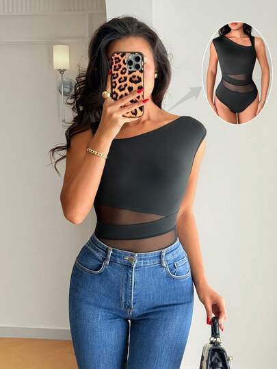 Rafferiza Áo liền thân nữ màu đen thanh lịch, ôm sát, gợi cảm với cổ áo bất đối xứng, chất liệu lưới xuyên thấu, phối hợp các mảng vải và đường cắt xẻ, phù hợp cho mùa xuân/hè. Áo liền thân thanh lịch dành cho nữ, áo liền thân dự tiệc, áo liền thân thời trang đi biển, áo liền thân phong cách thiên niên kỷ, áo liền thân mặc hàng ngày dành cho nữ.