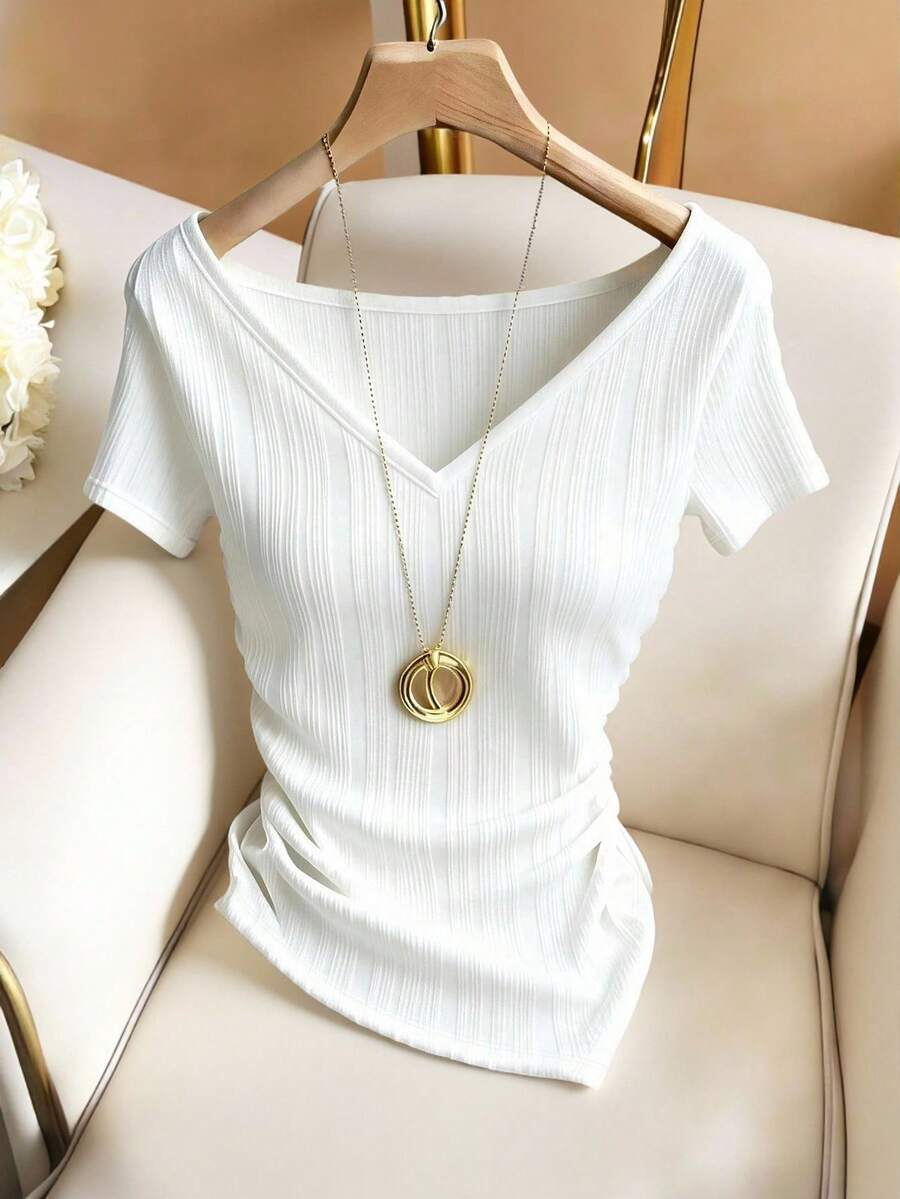 Franclia Áo thun nữ dáng rộng, cổ chữ V, eo thắt, vạt bất đối xứng, chất liệu vải dệt họa tiết. - trắng - Xem 1