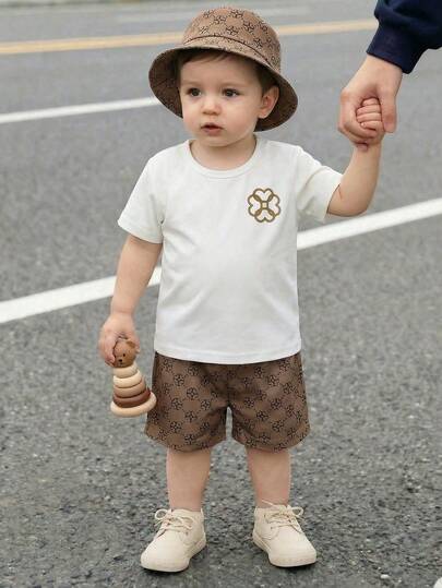 Souflis Souflis 3-Piece Outfit For Baby Boy/Toddler Boy: Floral Print T-Shirt, Shorts, And Hat, Fashionable, Casual, Cute, Versatile For Summer Occasions