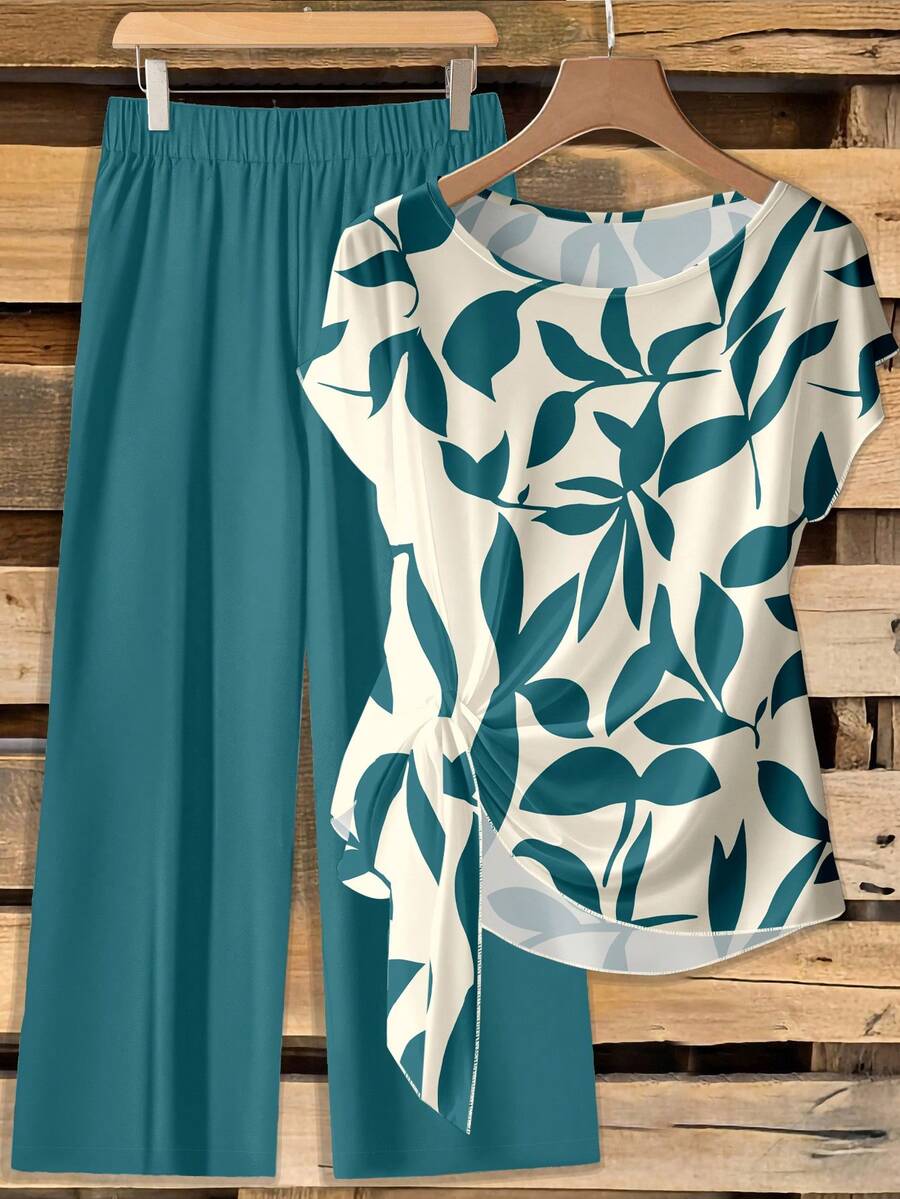 SHEIN Clasi 休闲复古优雅通勤百搭暖杏绿花卉印花图案，适合秋冬季节穿着。舒适宽松的圆领短袖衬衫配蝴蝶结和直筒裤两件套。 - 彩色 - 查看 1