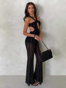 Glamine 女士亮片吊带镂空连体裤，时尚无袖修身连体裤，适合夜店狂欢；优雅女士黑色露背连体裤，带亮片细节；别致无袖镂空紧身衣，适合派对晚宴；时尚女士纯色无袖连体裤，带闪亮装饰，修身长裤连体裤，适合特殊场合；女士亮片吊带镂空连体裤，时尚无袖修身连体裤，适合夜店狂欢 - 黑色 - 查看 1