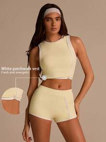 Fluxe Bộ đồ thể thao 2 mảnh dành cho nữ: áo hai dây cổ tròn viền gấu và quần short. - Vàng nhạt - Xem 12