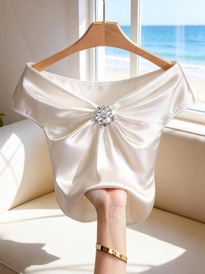 Franclia Women's Elegant Versatile Summer White Satin Ruched Off-Shoulder Blouse, Decorated With Rhinestone Buttons, Made Of Smooth Satin Fabric, Natural Drape, Gentle, Intellectual, Elegant, High-End, Stylish, Unique Off-Shoulder Design Skillfully Flatters The Face And Neck Line, Suitable For Office, Meeting, Party, Date, Vacation White Elegant Top White Satin Top Women Tops Elegant Rhinestone Top White Off Shoulder Top White Rhinestone Top Women's Dressy Top Elegant Satin Blouse Satin Tops For Women