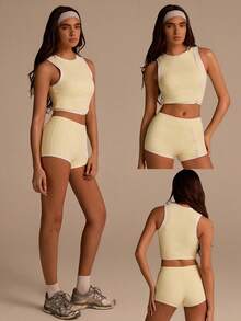 Fluxe Bộ đồ thể thao 2 mảnh dành cho nữ: áo hai dây cổ tròn viền gấu và quần short. - Vàng nhạt - Xem 10