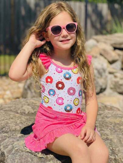 SHEIN Young Girl Summer Beach Vacation Donut Print Contrast Color Ruffle One-Piece Swimsuit And Wrap Tie Waist Skirt Set