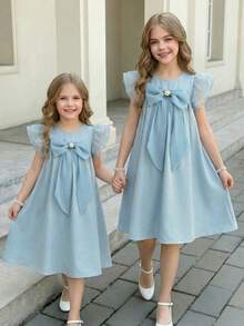 SHEIN Tween Girl Fashionable & Elegant Ruffle Sleeve Bow Deco Mesh Overlay Dress Dress For Summer Elegant Dress For Girls Tea Party Wear Girls Teen Girl Spring Dress Elegant Dress For Kids Tween Blue Dresses Bow Dress Girls Young Girl Elegant Bow Ruffle Strap Dress Light Blue Dress With Bow Light Blue Dress Teen Girl Blue Dress For Girls With Bows - Green - View 1