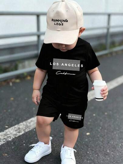 1 Conjunto Moda Casual Confortável Minimalista Criativa de Meninos Jovens, Camisa de Manga Curta com Estampa Xadrez e Gráfico de Letras "LOS ANGELES" e Shorts, Adequado para Meninos Usarem na Primavera ao Verão