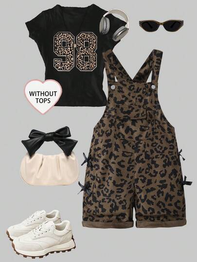 بنطلون قصير للفتيات الصغيرات بطراز لطيف وممتع، للأطفال الصغار، بلون بني قهوائي، مزين بفيونكة سوداء على الجوانب، بتصميم نمط نمر أسود على قاعدة بنية، بساق مستقيمة فضفاضة، من قماش الكوردروي الناعم والمريح، مناسب للمدرسة والتنقل والارتداء اليومي في الخارج