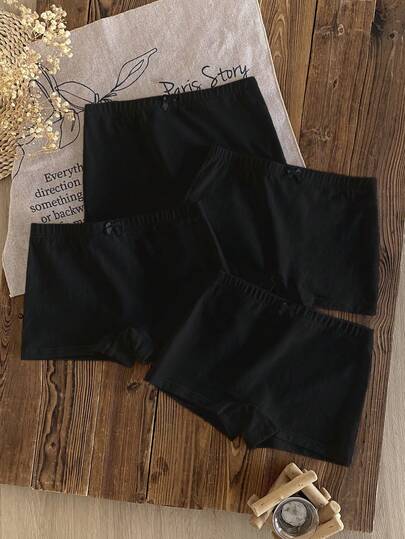 Bộ 4 chiếc quần lót cho bé gái, họa tiết nơ và hoa dễ thương, chất liệu cotton mềm mại, thoáng khí, nhiều màu sắc.