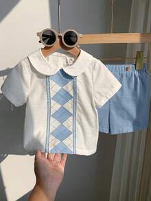 SHEIN Bộ đồ 2 món cho bé trai mùa hè, kiểu dáng thường ngày, dễ thương, màu trắng in họa tiết, cổ búp bê, tay ngắn và quần short cạp chun, thích hợp cho tiệc sinh nhật, tiệc rave, tiệc tối, biểu diễn, đám cưới, tiệc mừng em bé và lễ kỷ niệm sinh nhật lần thứ nhất. - Màu xanh lam - Xem 5