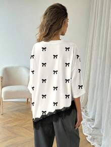 SHEIN LUNE Áo thun nữ màu trơn, vạt áo bất đối xứng, phối ren, kiểu dáng thường ngày, đa năng, thích hợp mặc đi nghỉ mát, hè, xuân, nghỉ xuân và nhiều dịp khác, bao gồm váy đi biển, áo sơ mi thường ngày, áo khoác ngoài và áo mùa hè. - Nhiều màu - Xem 5