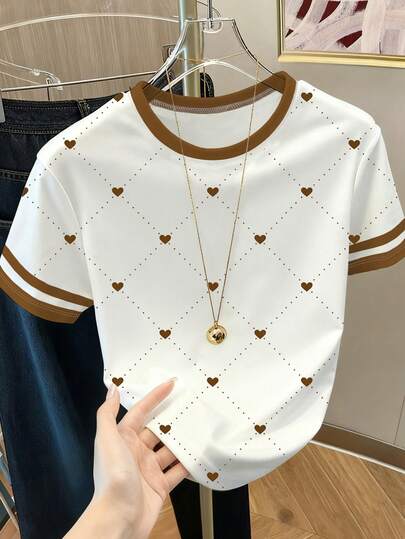 Resyla Camiseta casual de mujer de manga corta con estampado de corazón y cuello redondo de color contrastante