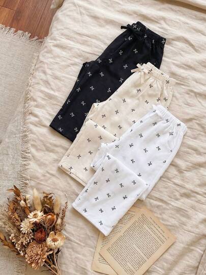 SHEIN Vintaside Kids 3件套女童裤装，蝴蝶结图案搭配3D立体蝴蝶结针织，外出更显可爱。多色组合，黑/白/杏色，百搭黑色长裤，时尚白色和杏色长裤，直筒裤型。春夏款，中等厚度舒适面料。