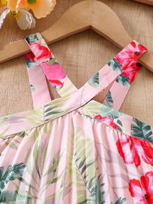 SHEIN 这款女童热带度假风露背连衣裙采用柔软轻盈的面料，饰以鲜艳的热带花卉和叶子印花，宽松飘逸的廓形，适合海滩、户外派对和其他夏季休闲场合。这款连衣裙款式多样，包括沙滩装、大童装、小女孩装、热带风情连衣裙、幼儿夏威夷连衣裙、芙蓉花连衣裙、儿童度假连衣裙、女童印花连衣裙、女童粉色印花吊带连衣裙、幼儿波西米亚风连衣裙、夏季服装、优雅派对连衣裙和女童夏季连衣裙。 - 淺粉色 - 查看 3