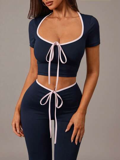 Radiana 2-Piece Navy Blue Elastic Knit Casual Suit, Colorblock Trim Square Neck Cropped T-Shirt And V-Waist Fitted Flare Pants Set, Casual Activewear, High-Quality Knit Set, Pants Suit, Fitted Set, Leisure Two Pieces, Casual Wear, Yoga Outfit, Sportswear, Jogging, Tennis, Badminton, Fitness, Dance, Cycling, Stretchy Knit Fabric, Body-Hugging, Curve-Flattering, Suitable For Casual Outings, City, Shopping, Exercise