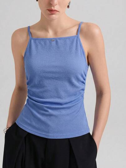 Ontre 2026new Women's Blue Elastic Knit Fabric Comfortable Skin-Friendly Fitted Camisole With Spaghetti Strap, Side Ruched Pleats Decoration, Front Metal Silver Logo Accent, Chic Urban Casual Business Office Wear, Low-Key Vintage Vibe, High-Quality Airport Fashion All-Season Versatile Modern Urban Fashion Business Casual Women's Wear Office Attire Understated Old-Money Style, Elegant And Sophisticated, High-Quality Commuter And Airport Women's Wear Blue Top