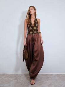 Nöista Printed Halter Top With Deep V Neckline And Fitted Silhouette. Boho-Inspired Design Perfect For Spring And Summer Outfits, Easter Looks, Beachwear, Vacation Styling, And Festival Outfits. - Brown - View 1