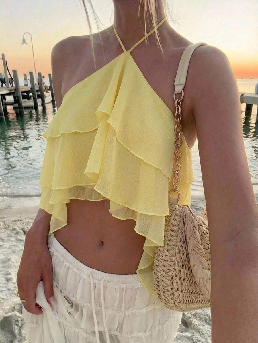 Aloruh 女士夏季简约纯色荷叶边不对称下摆露背吊带衫，飘逸上衣，适合夏季海滩度假、波西米亚风、热带风情度假、音乐会、锐舞节、乡村音乐会、伊比沙岛、纳什维尔等场合，尽显西部风情。这款女士西部波西米亚街头风热带可爱夏季上衣，搭配浅黄色奶油色多层荷叶边露背吊带衫，营造浪漫氛围。 - 淡黃色 - 查看 1