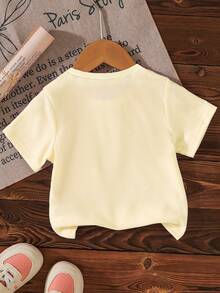 1 pieza de camiseta de cuello redondo de manga corta con estampado floral de verano casual y linda para niñas jóvenes, adecuada para salidas en vacaciones de verano, nueva moda SS26, atuendos de verano - Amarillo - Ver 2
