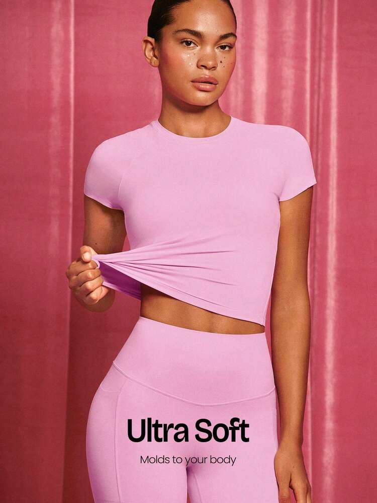 Camiseta corta de cuello redondo elástica y suave, ajustada, de manga corta, para actividades de bajo impacto como yoga, pilates y uso diario casual